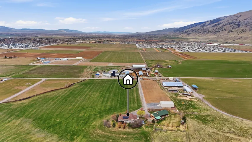 View of rural area with mountains and extensive farmland