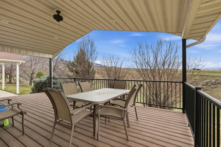 Wooden terrace featuring outdoor dining space