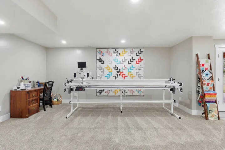 Miscellaneous room featuring light carpet and recessed lighting