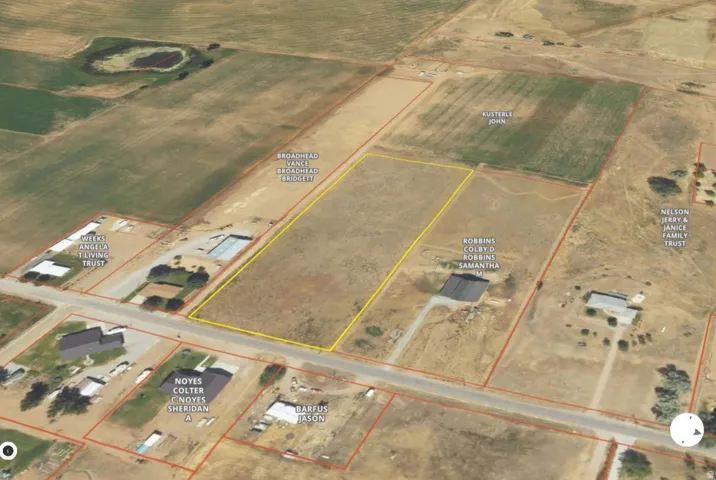Aerial overview of property's location featuring property parcel outlined