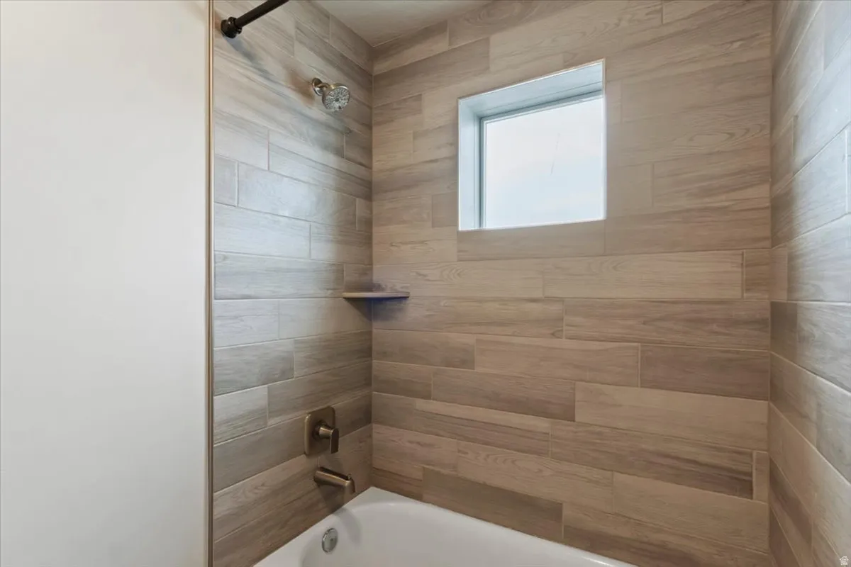 Full bathroom featuring shower / bath combination