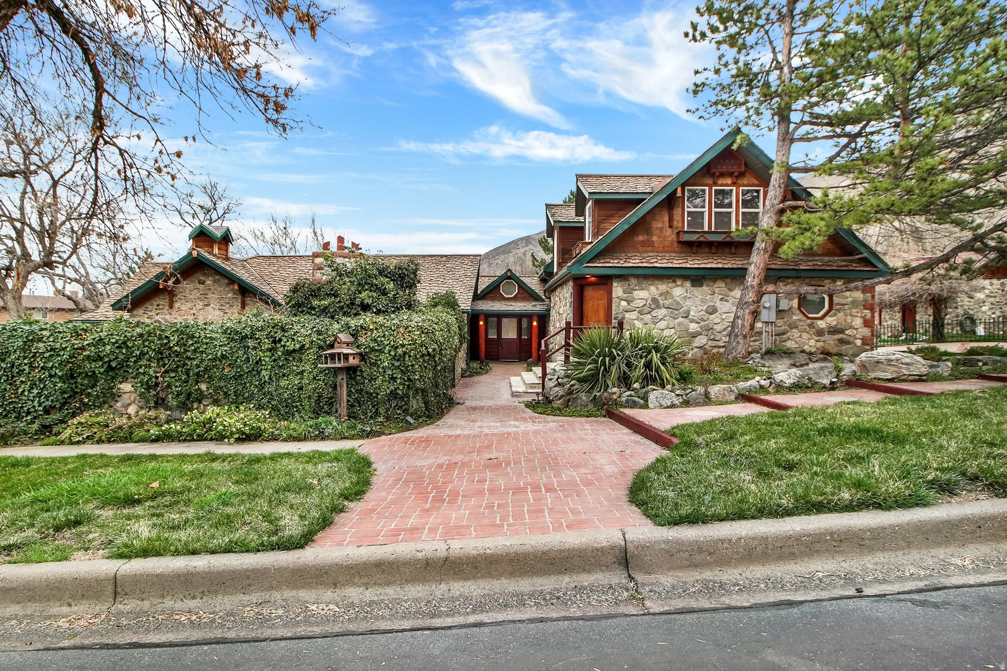 View of front of home featuring stone siding