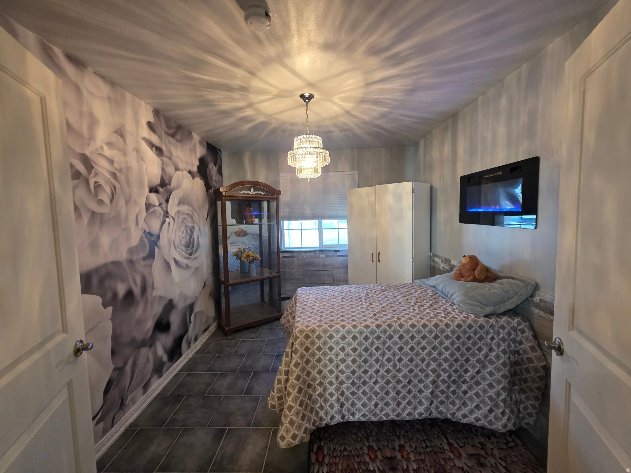 Bedroom with hanging lights