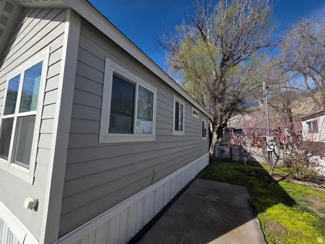 View of home's exterior featuring a patio area
