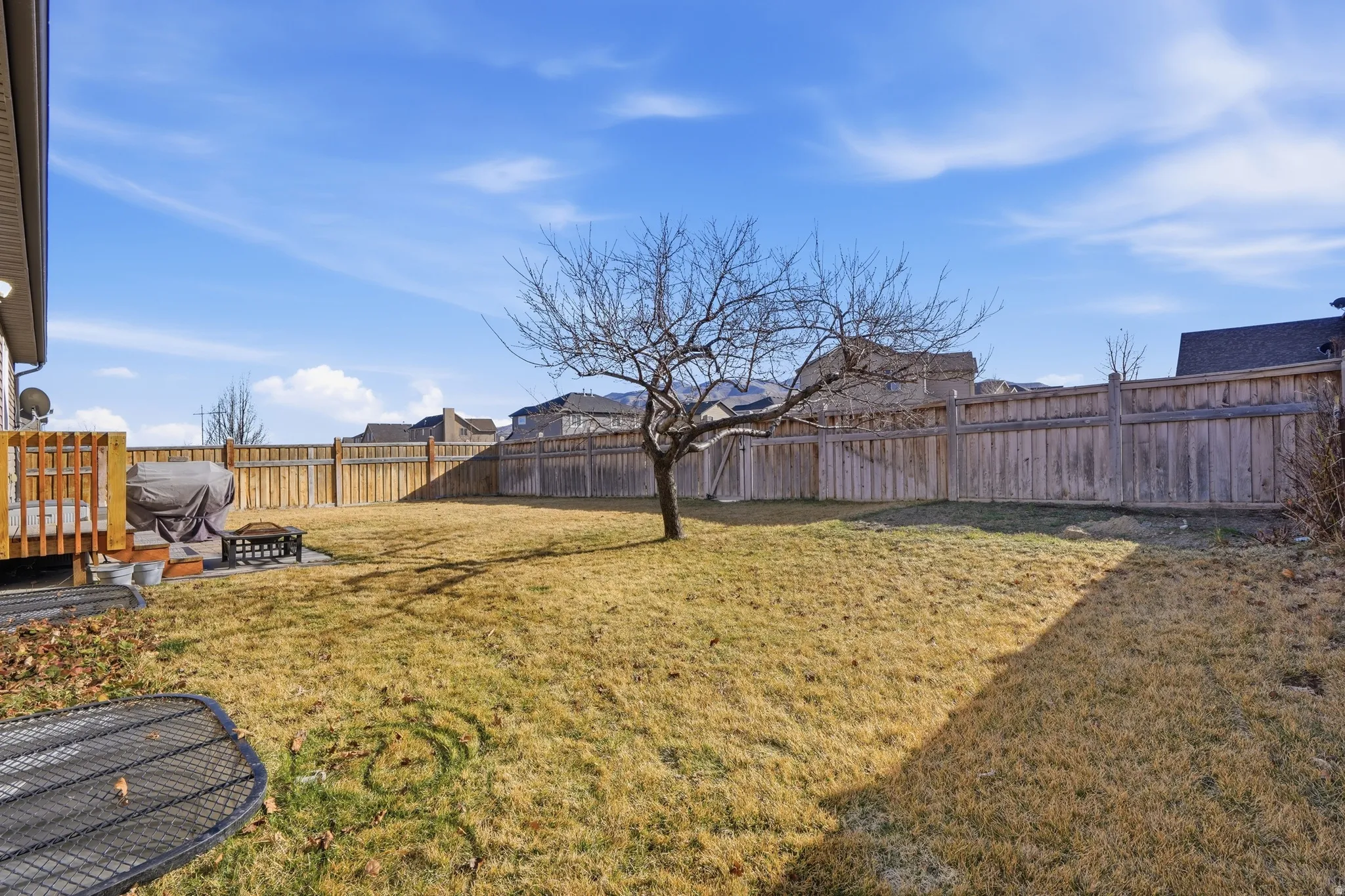 Fenced backyard featuring a patio area