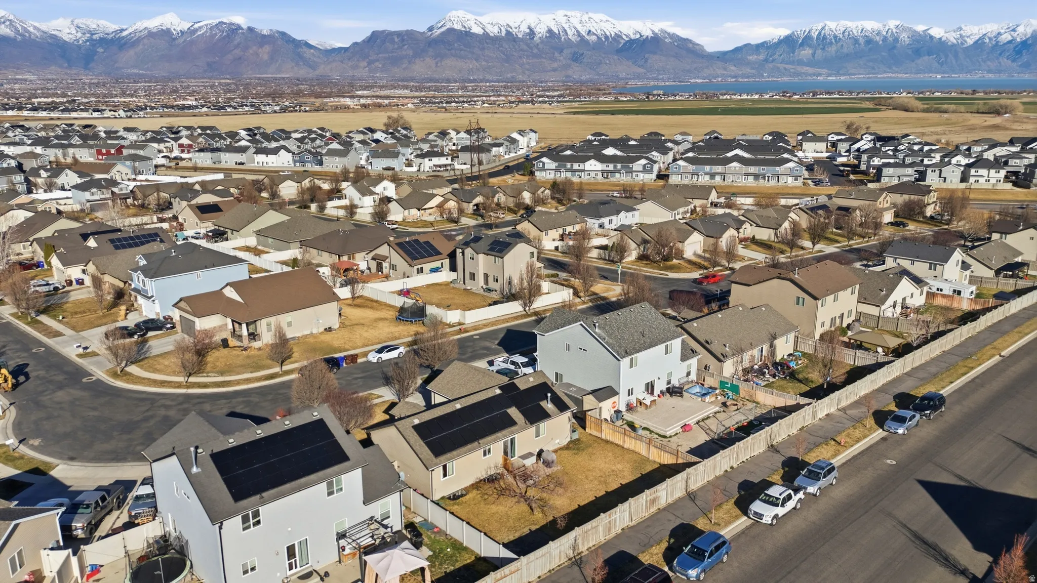 View of property location with a mountain backdrop and nearby suburban area