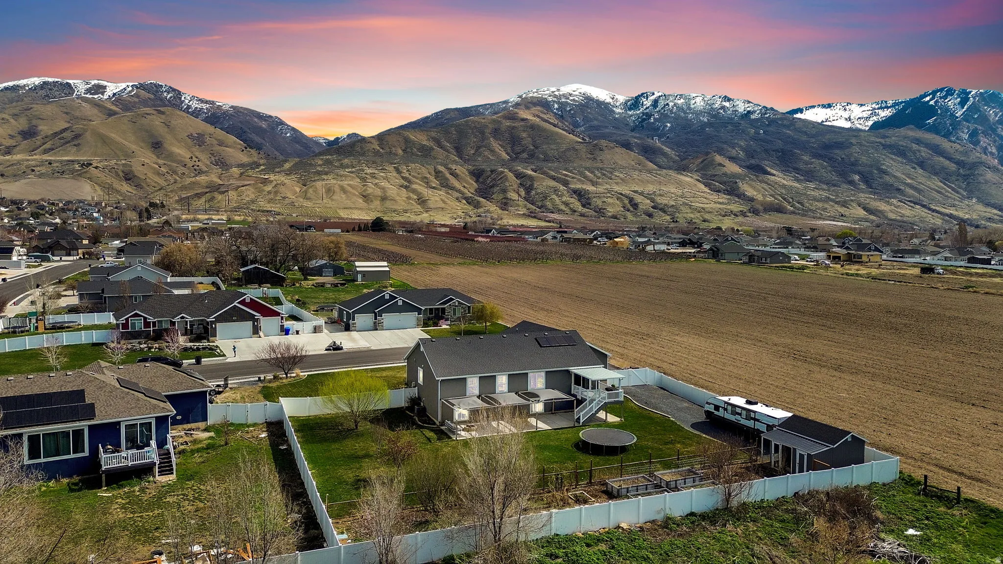 Aerial view of residential area with a mountain backdrop