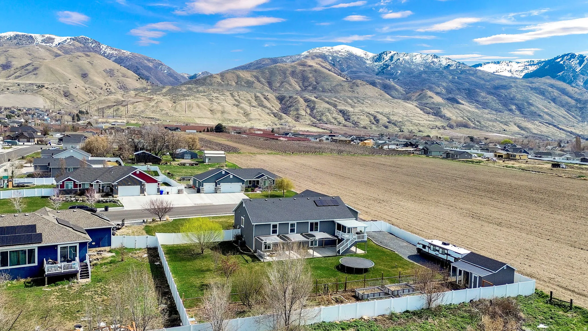 Aerial perspective of suburban area featuring mountains