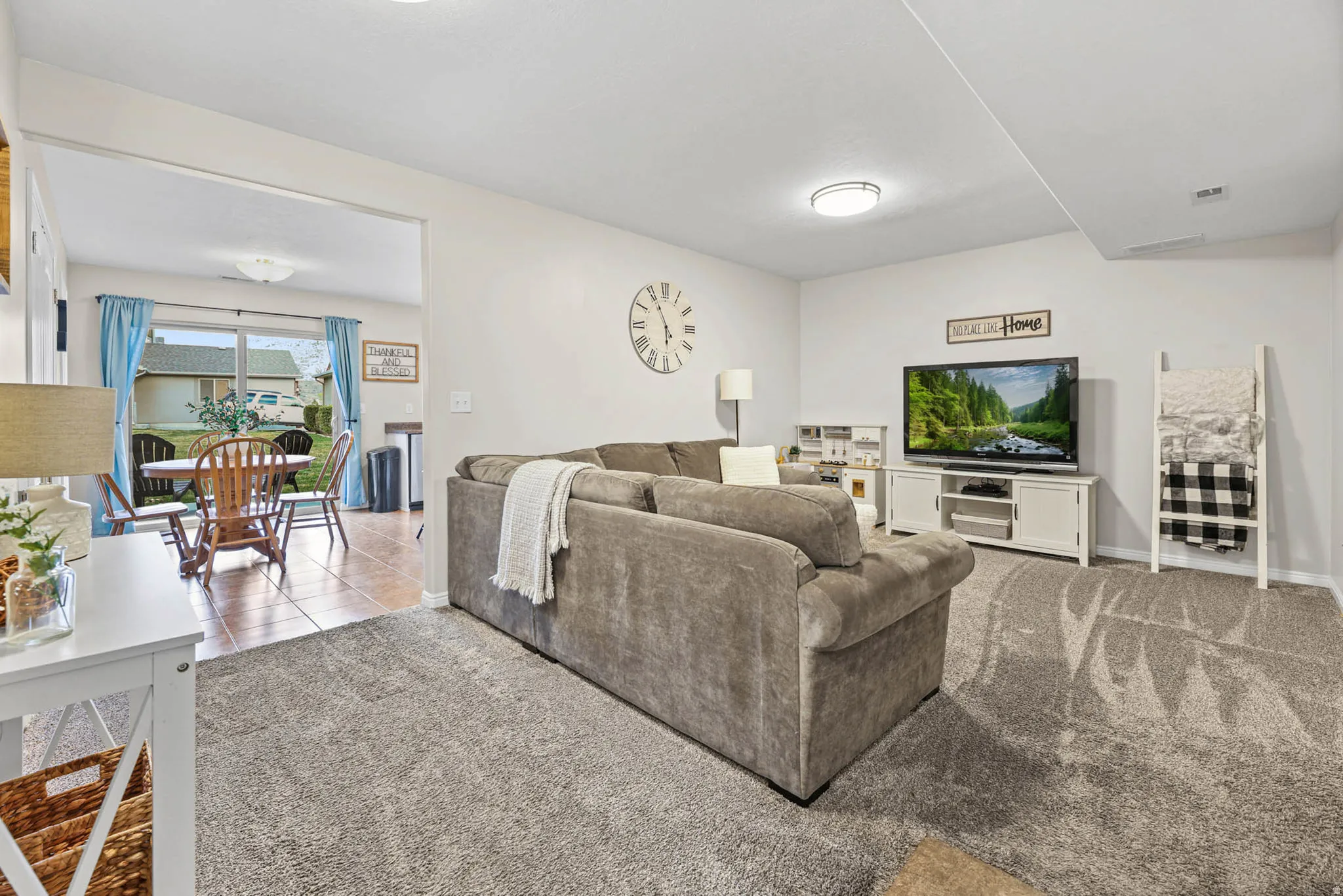 Living area featuring carpet flooring