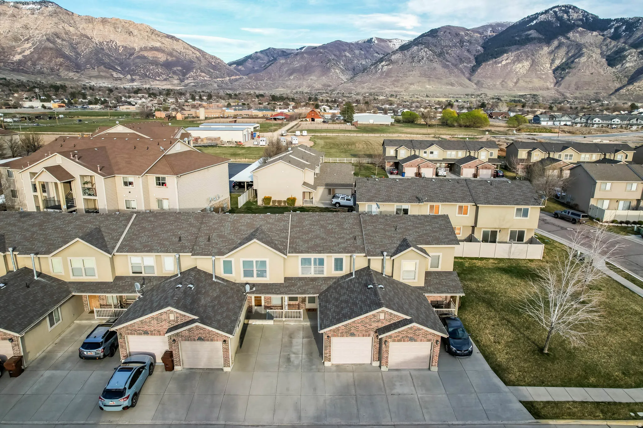 Aerial view of residential area with a mountain backdrop
