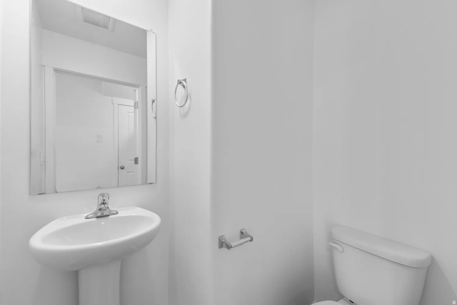 Bathroom with toilet and a sink