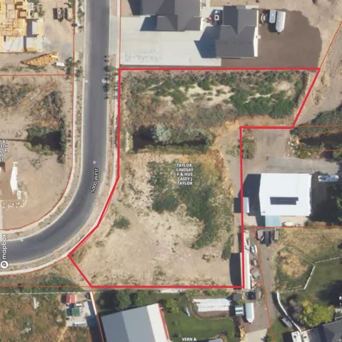 Aerial view of property's location featuring property parcel outlined