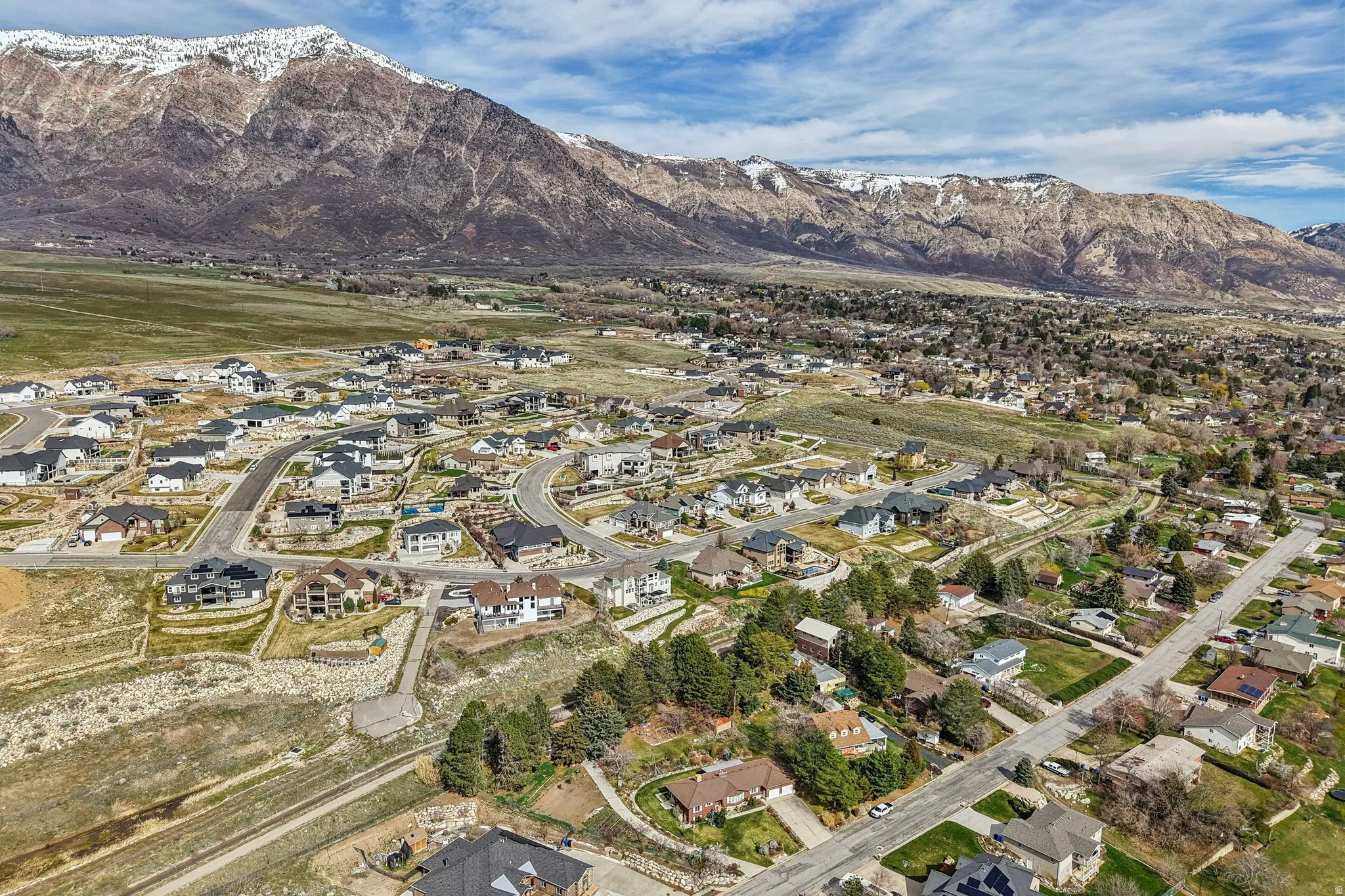 Aerial view of residential area with a mountain backdrop