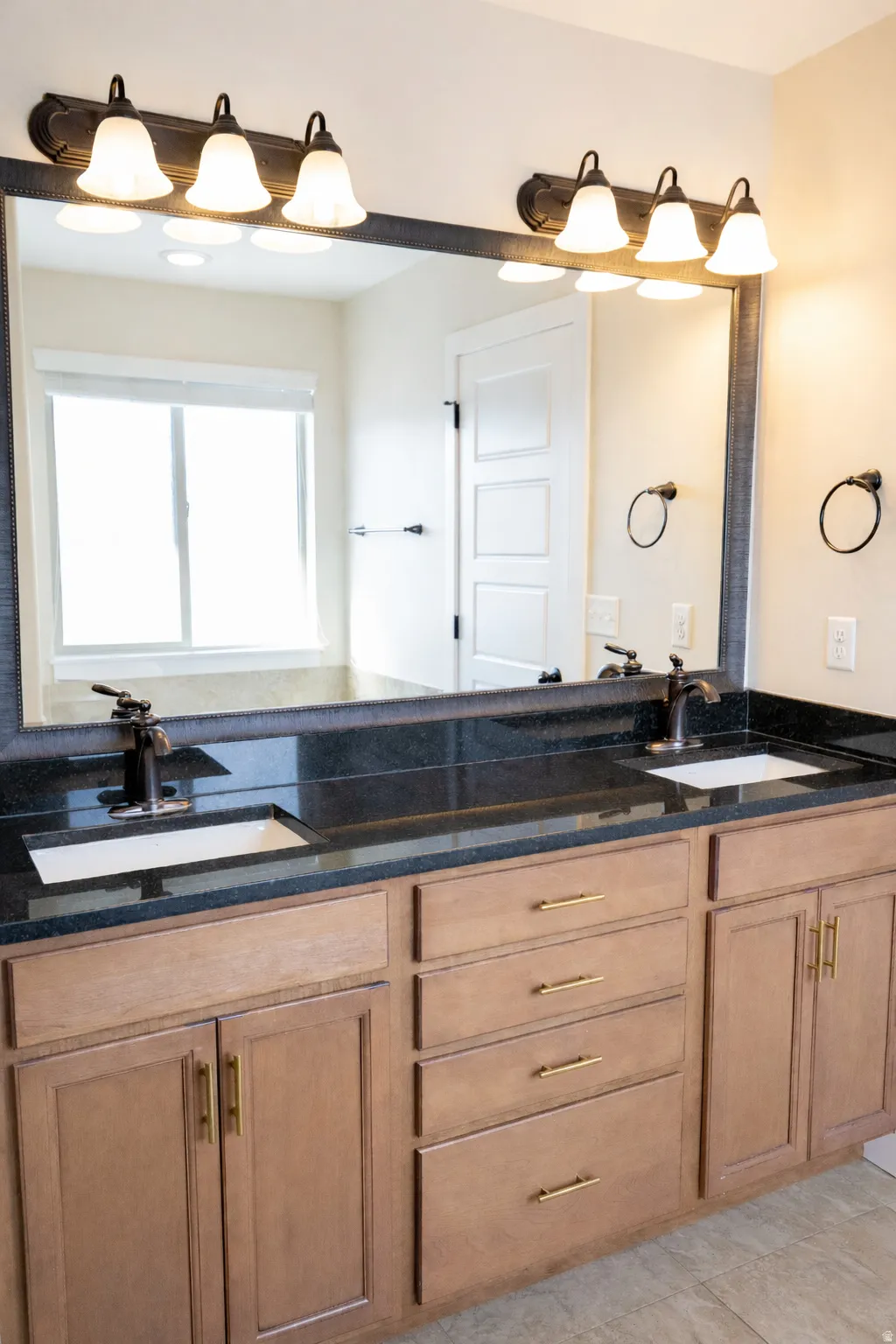 Bathroom featuring double vanity