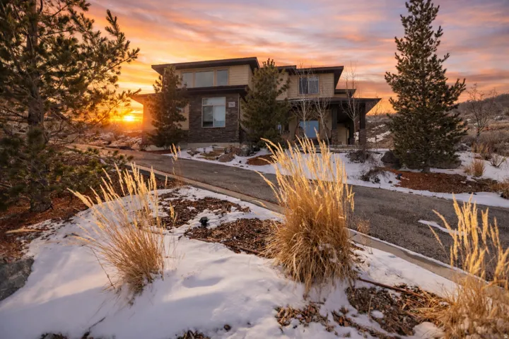 Stunning sunset views and serene mountain surroundings from the front of the home