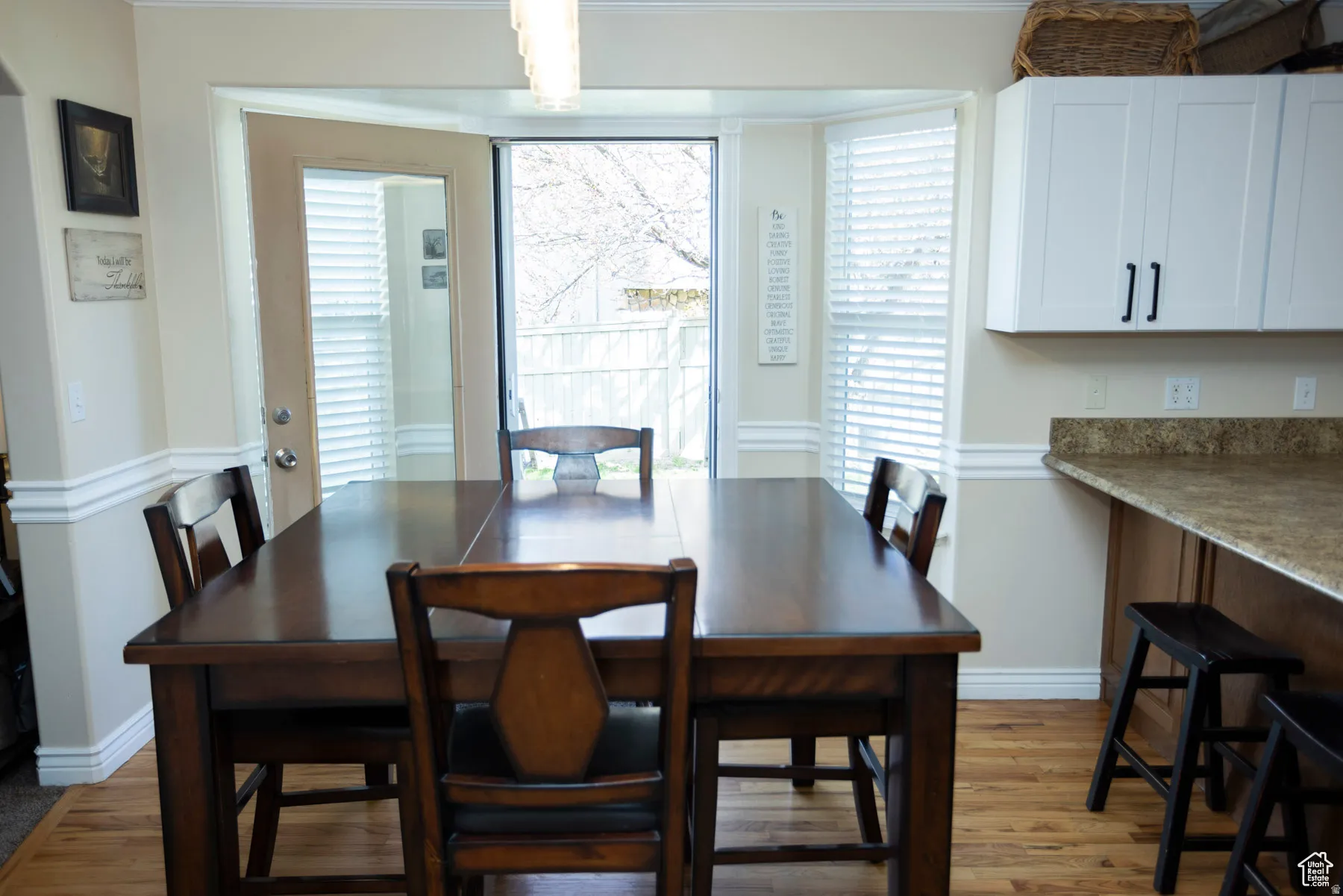 Dining space with light wood-type flooring