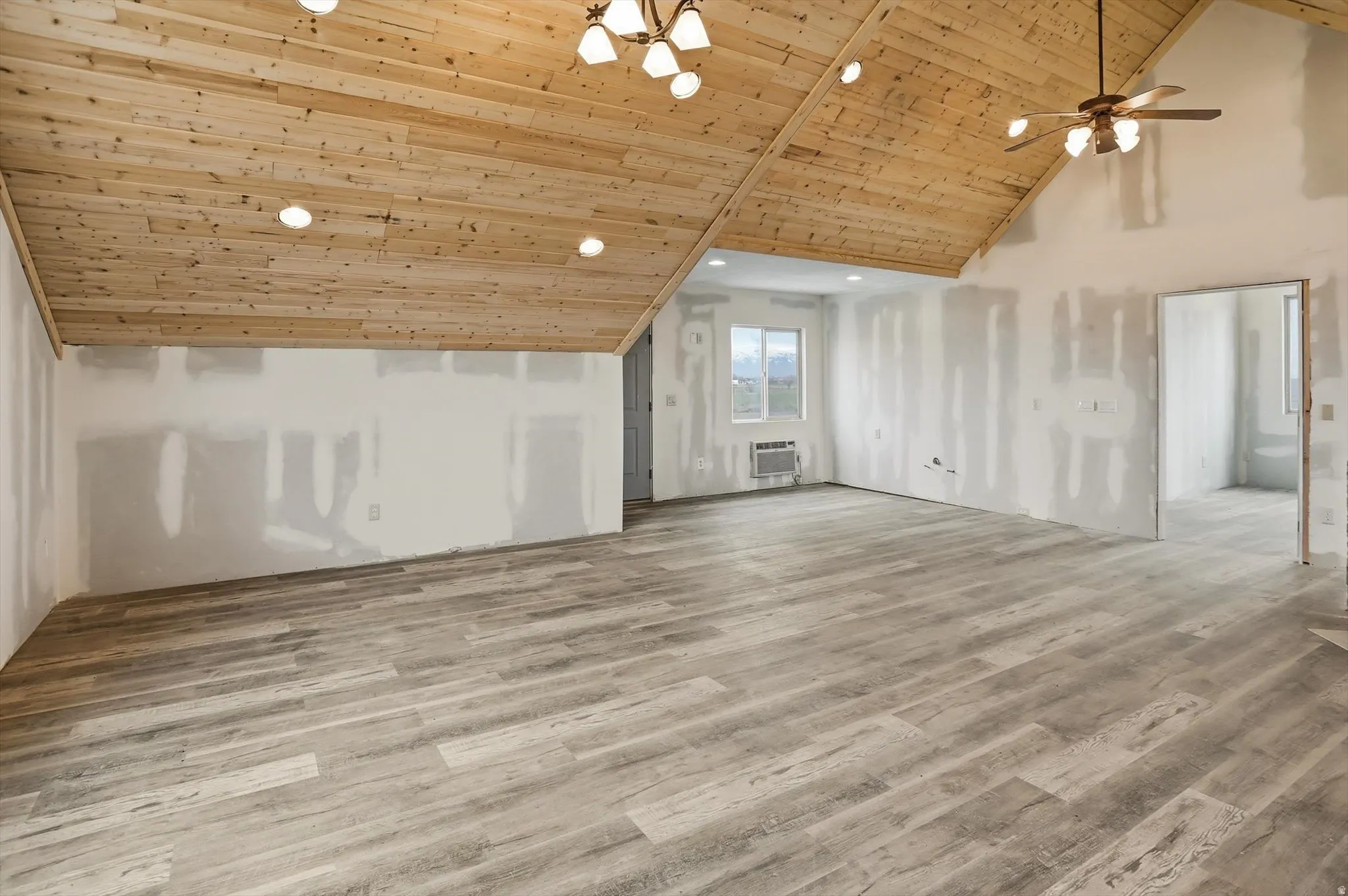 Bonus room with a vaulted wooden ceiling, light wood-style flooring, ceiling fan, and recessed lighting