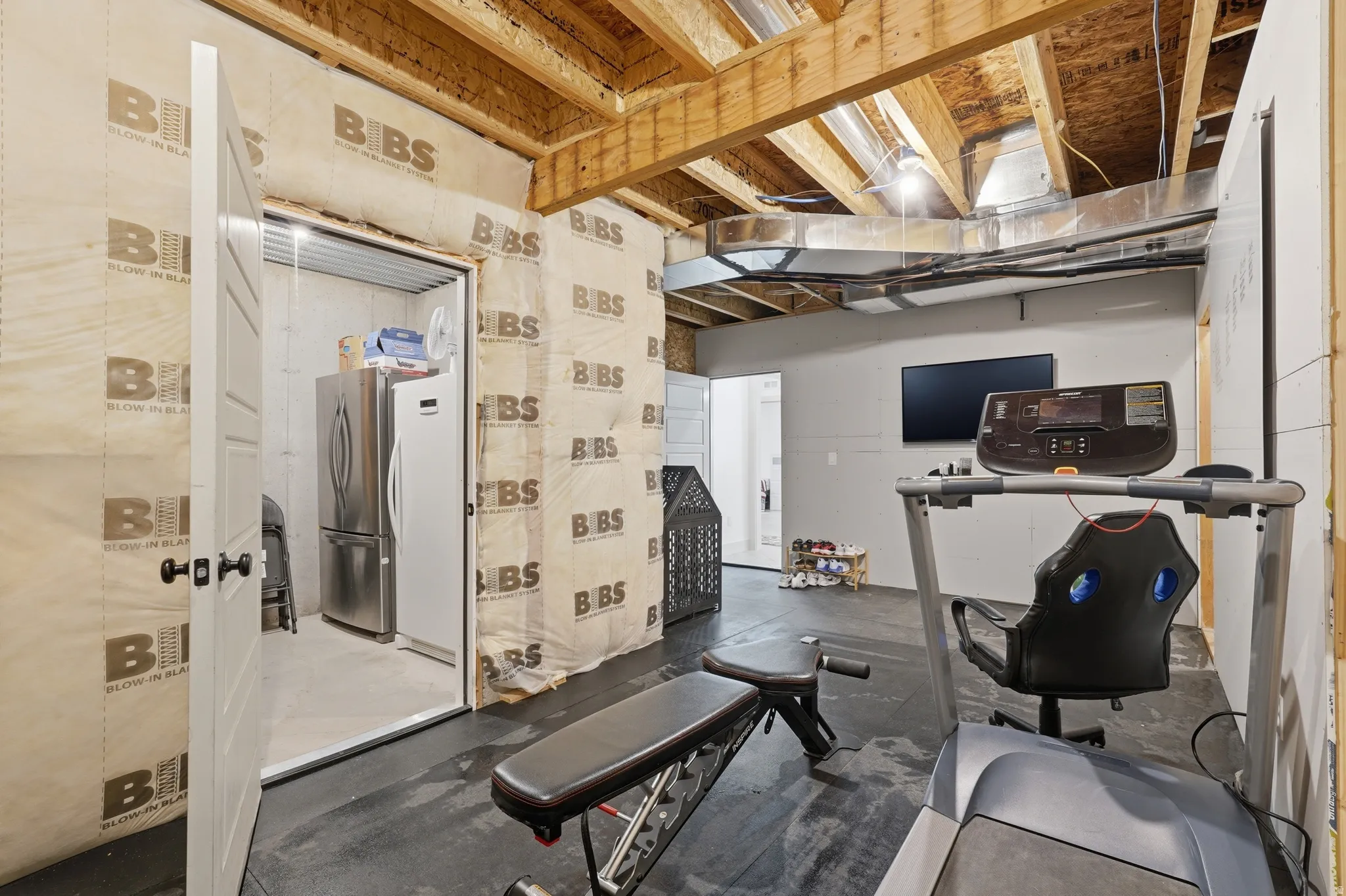 Workout area featuring concrete flooring