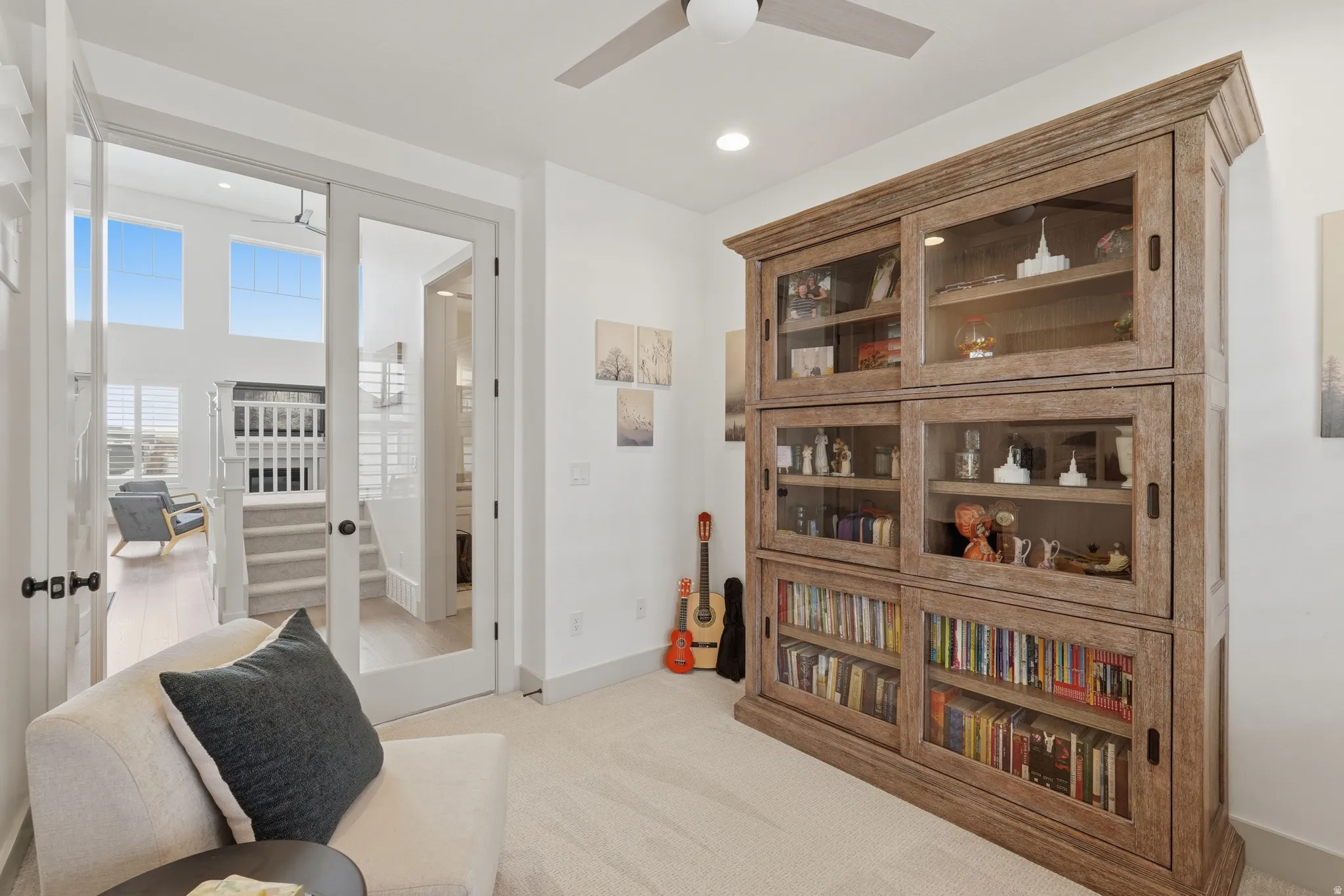 Sitting room with light carpet, french doors, ceiling fan, and recessed lighting