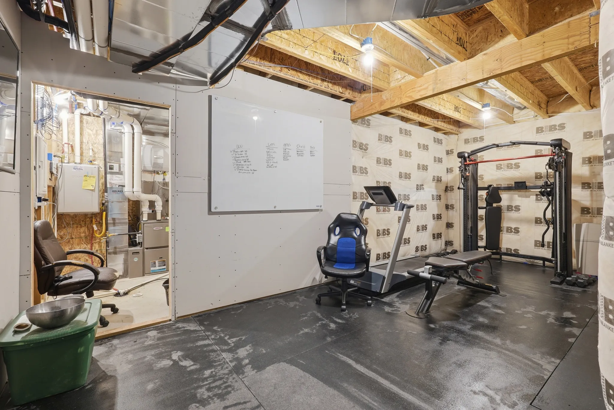 Exercise room with concrete flooring