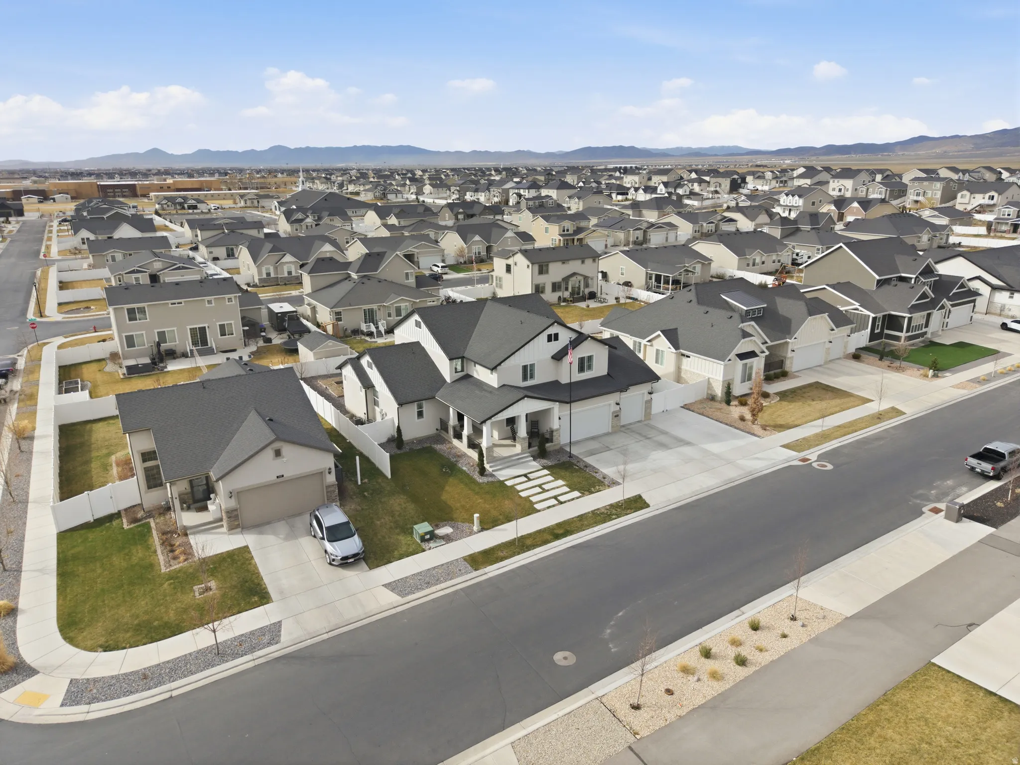 Aerial view of residential area with mountains