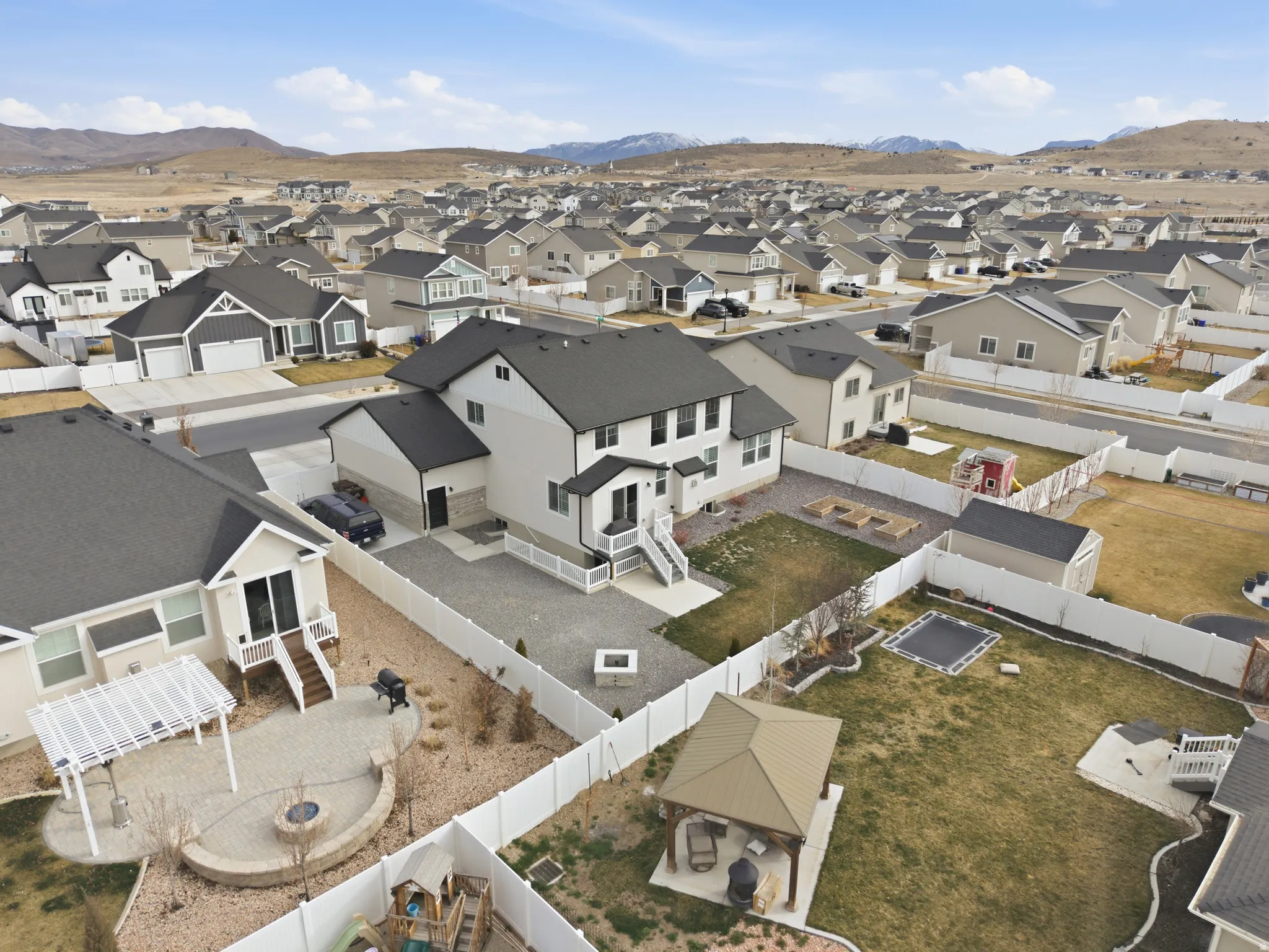 Aerial view of residential area with a mountain backdrop