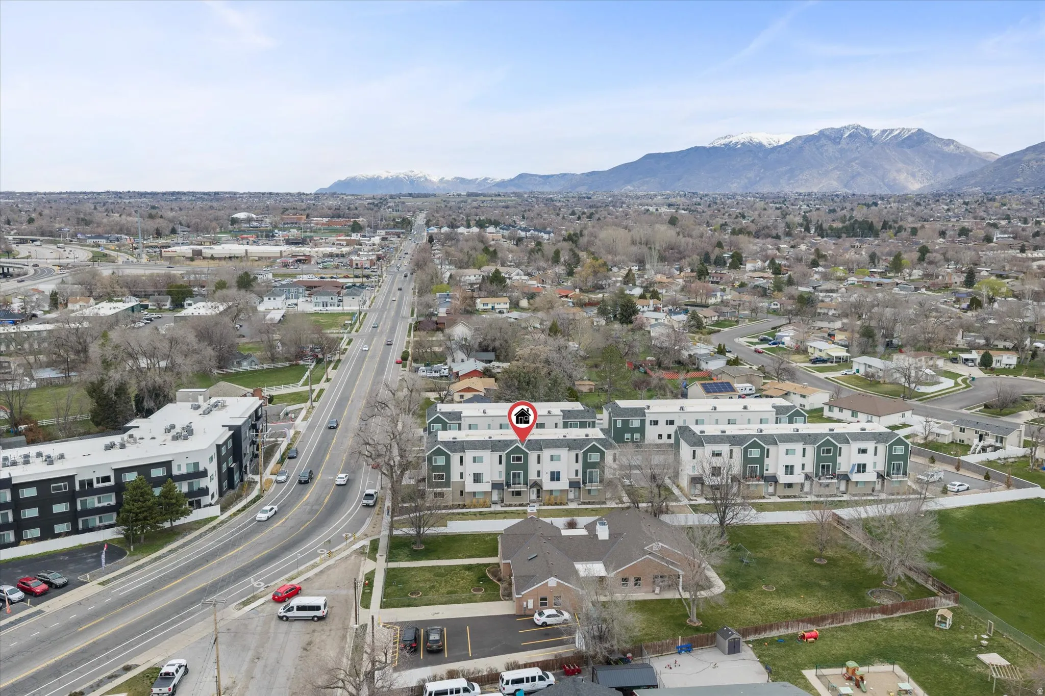 Aerial view of property's location with mountains and Layton city.