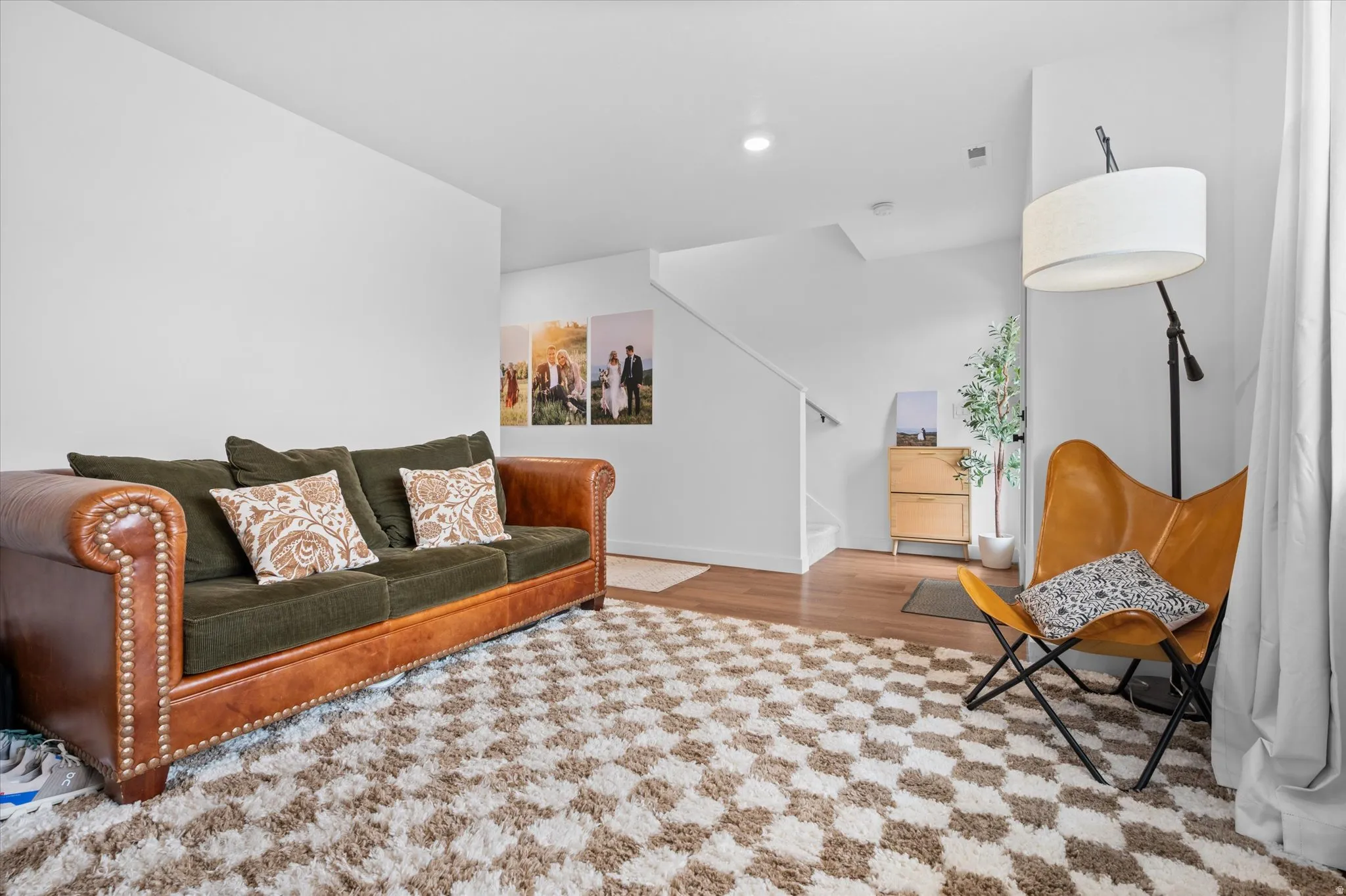 Living/Family room with LVP flooring and beautiful decor.