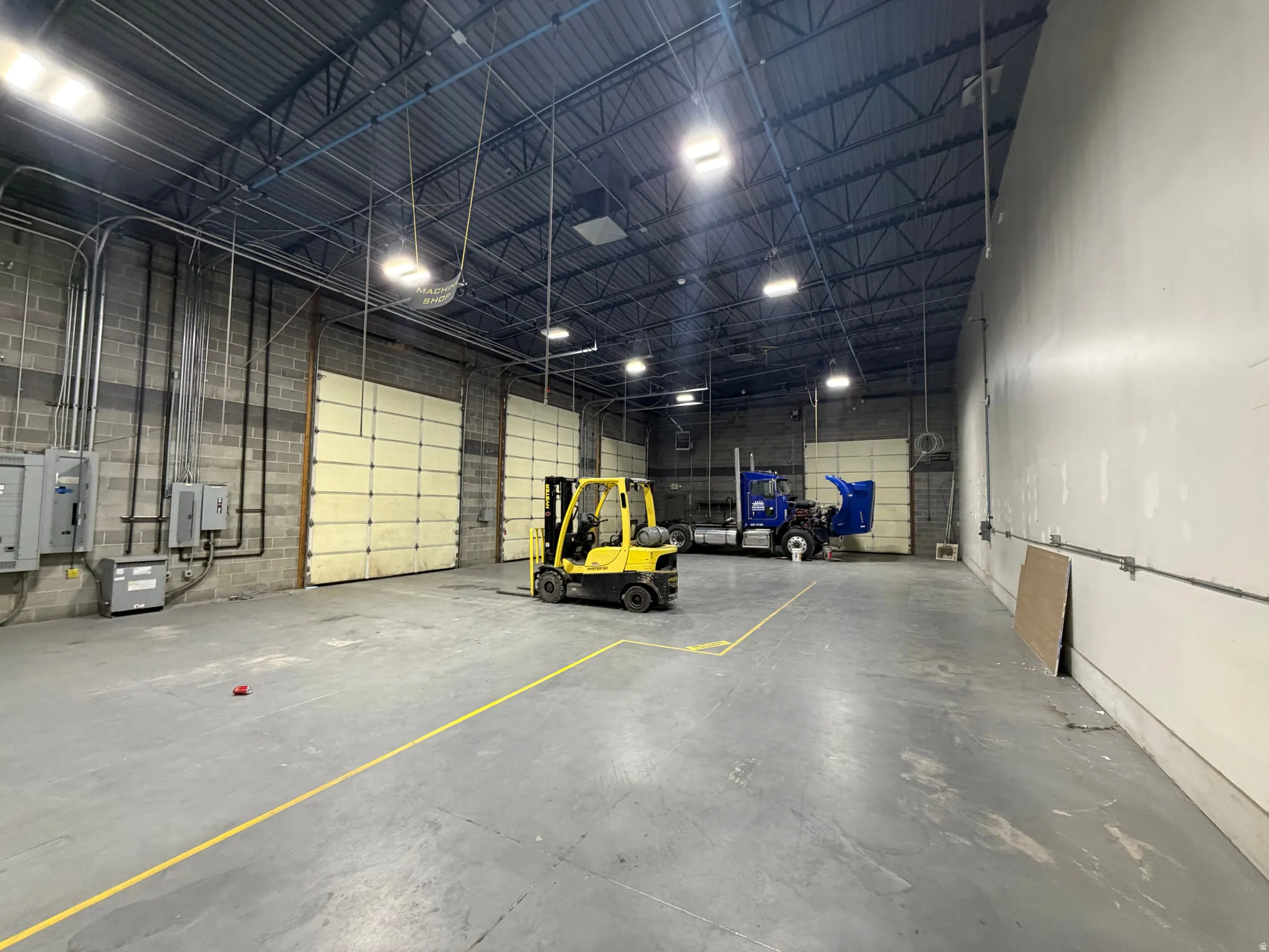 Garage featuring electric panel