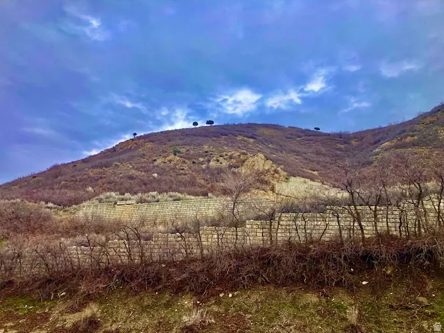 View of mountain background featuring rural landscape from front foor