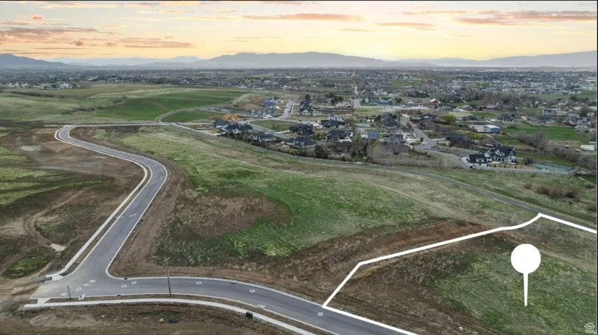 Aerial view at dusk of a mountain view and a residential view