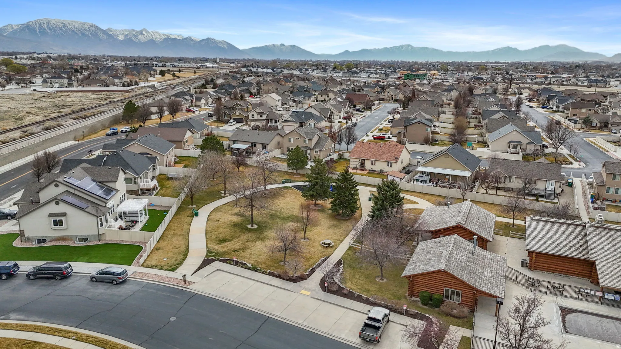 Aerial perspective of suburban area featuring mountains
