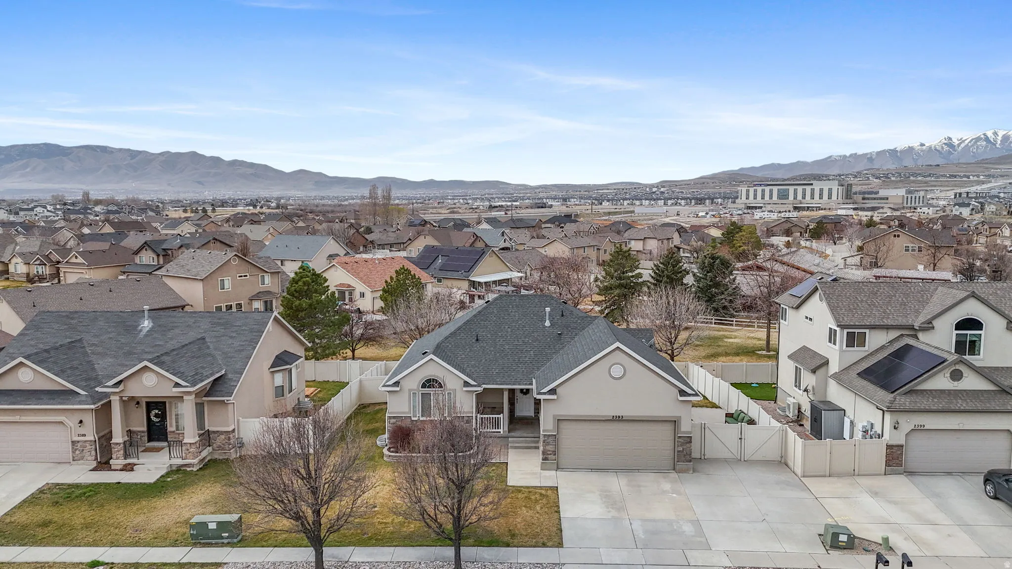 Aerial view of residential area with mountains
