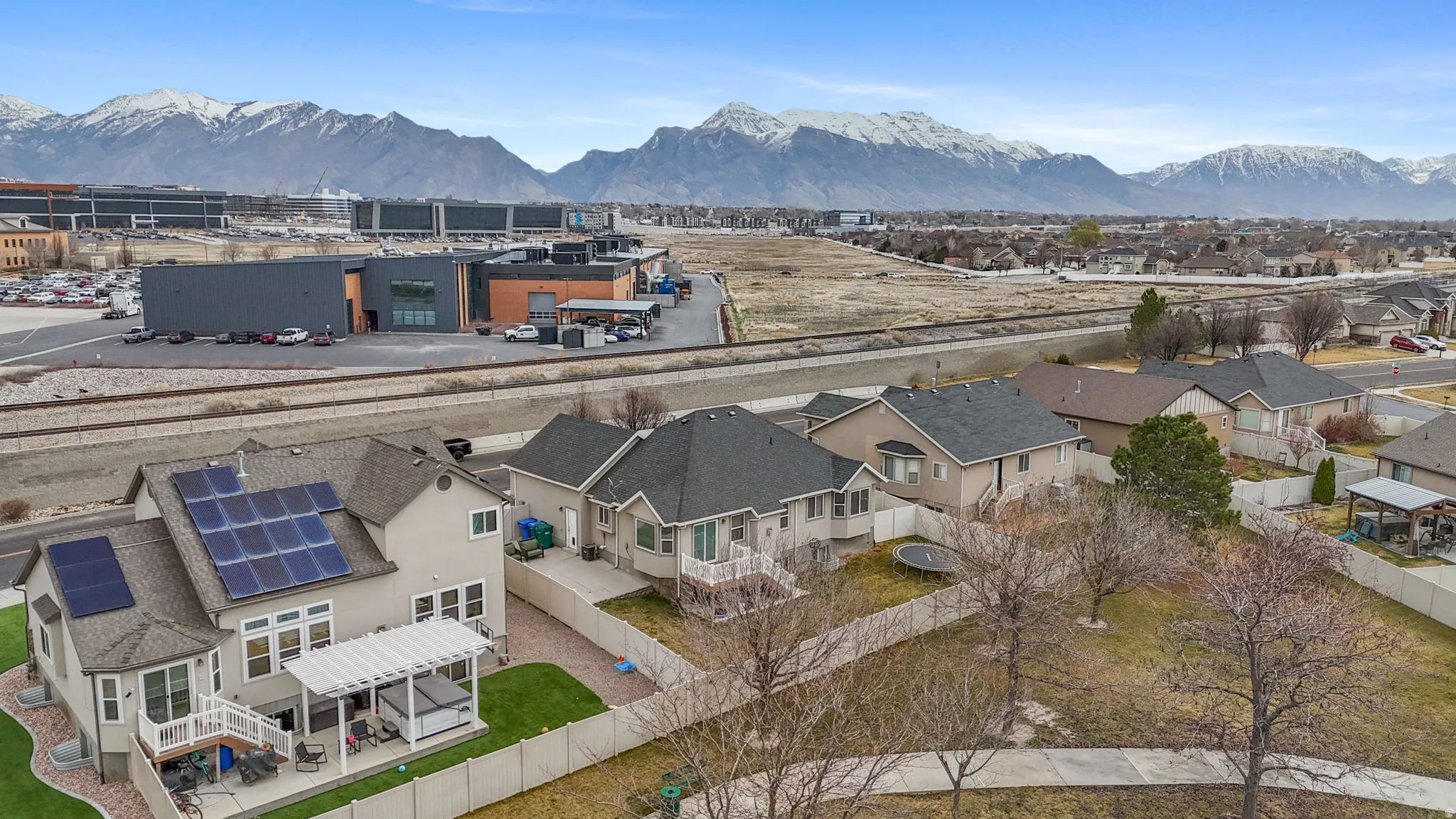 Aerial perspective of suburban area with mountains