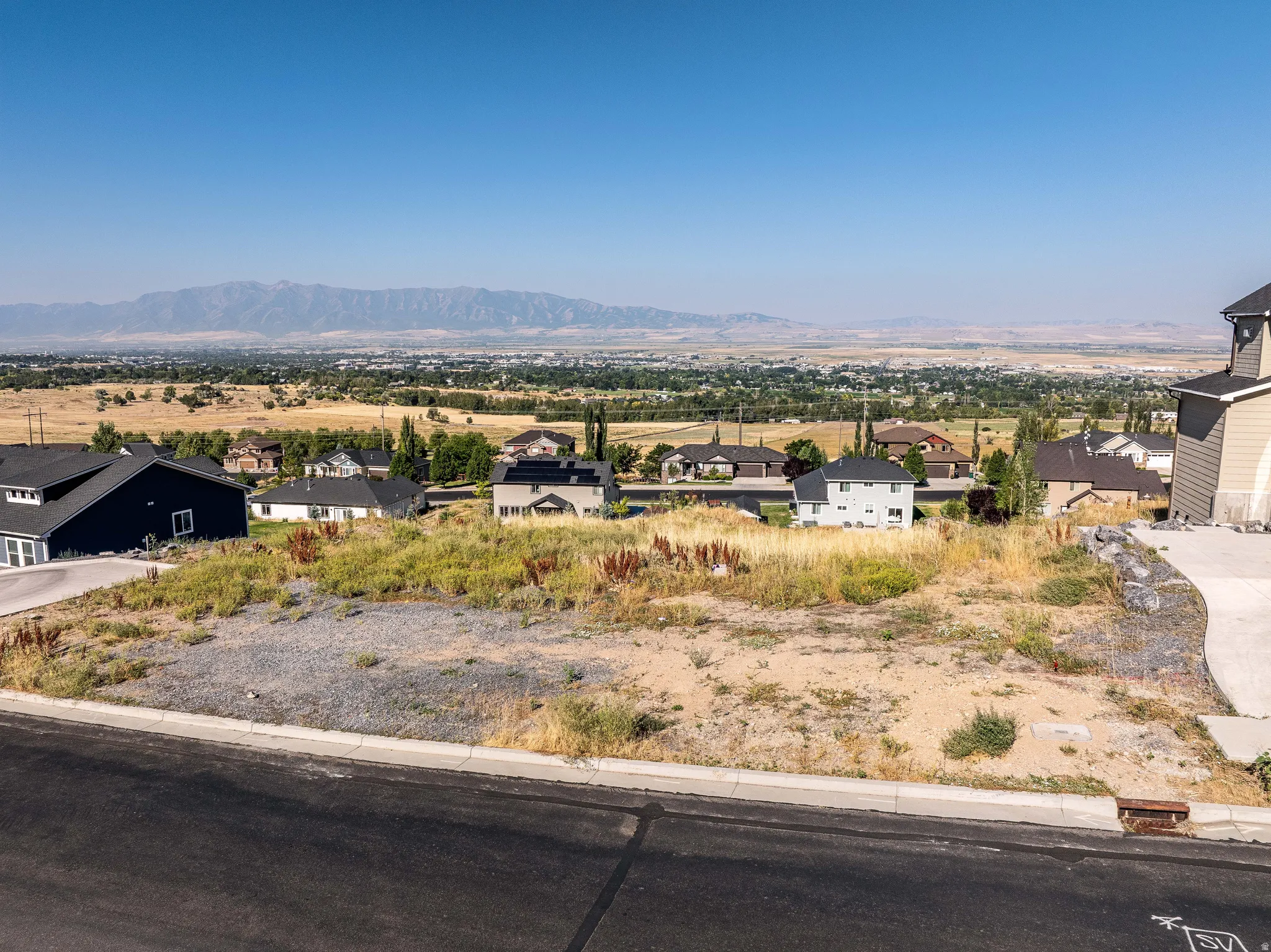 Mountain view featuring nearby suburban area