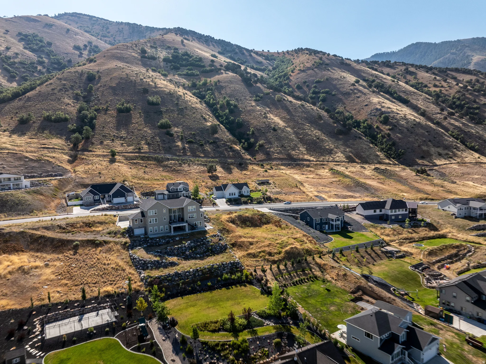 View of mountain background featuring nearby suburban area