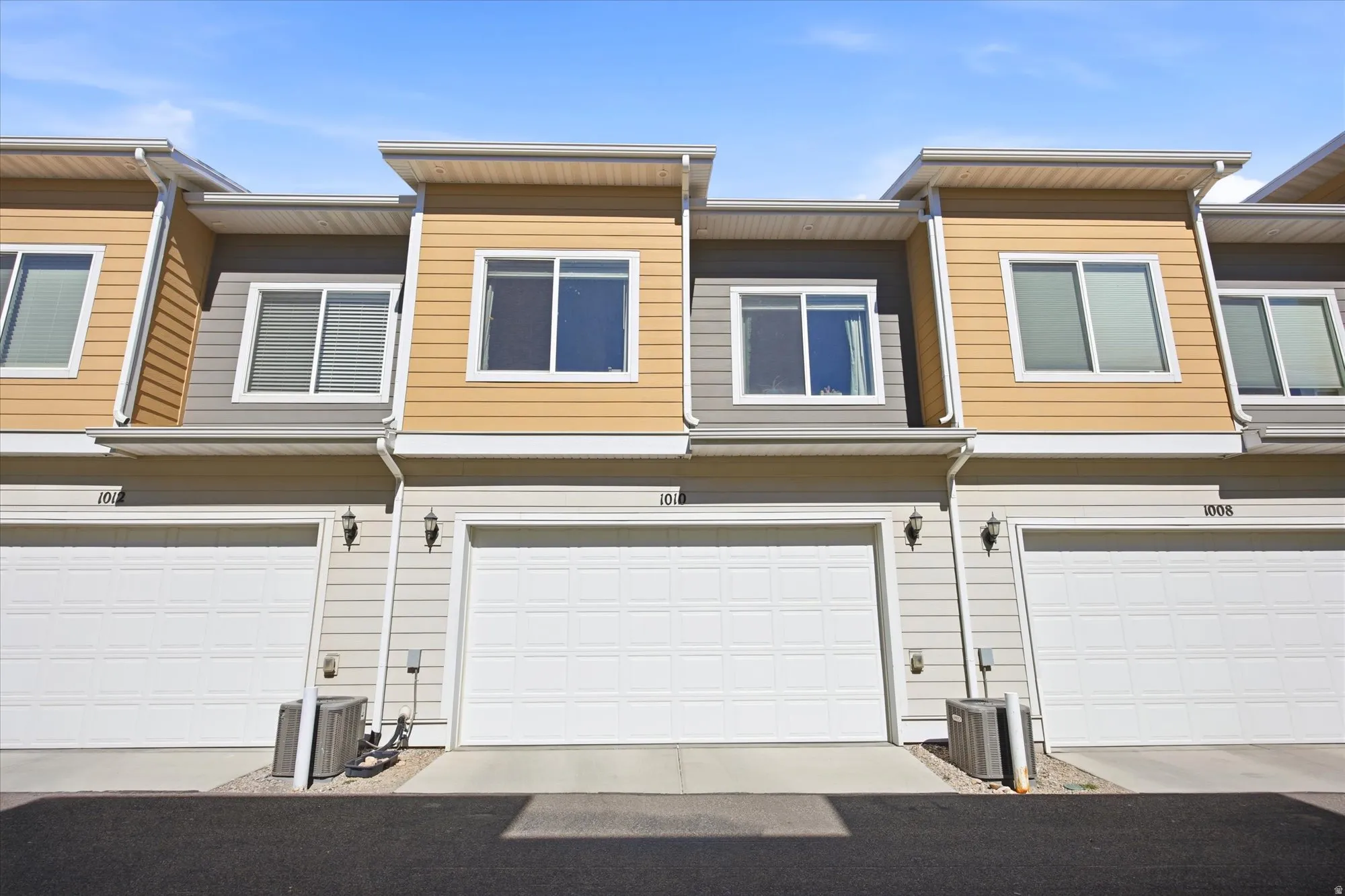 View of front facade featuring a garage