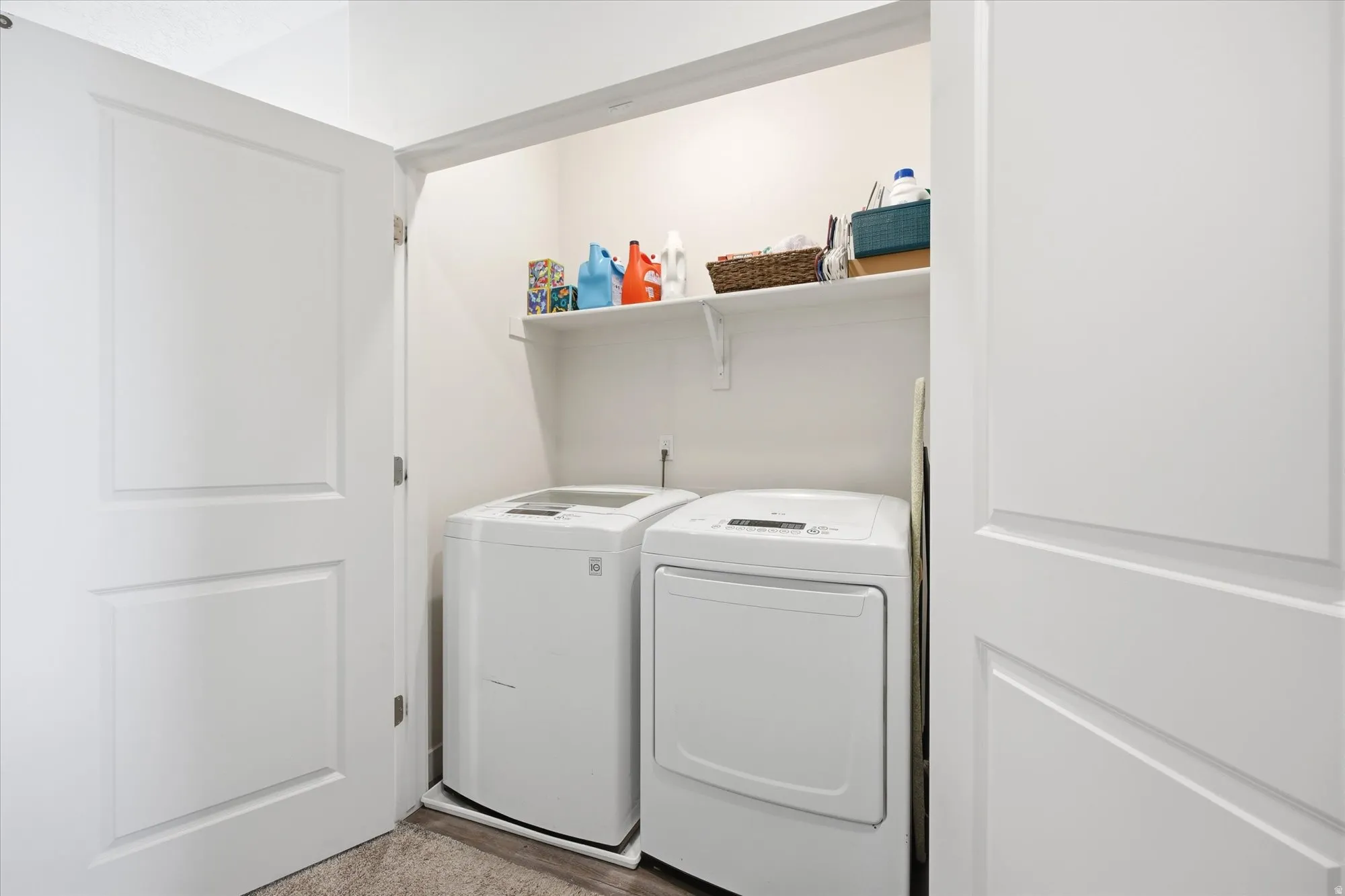 Laundry area featuring washer and clothes dryer