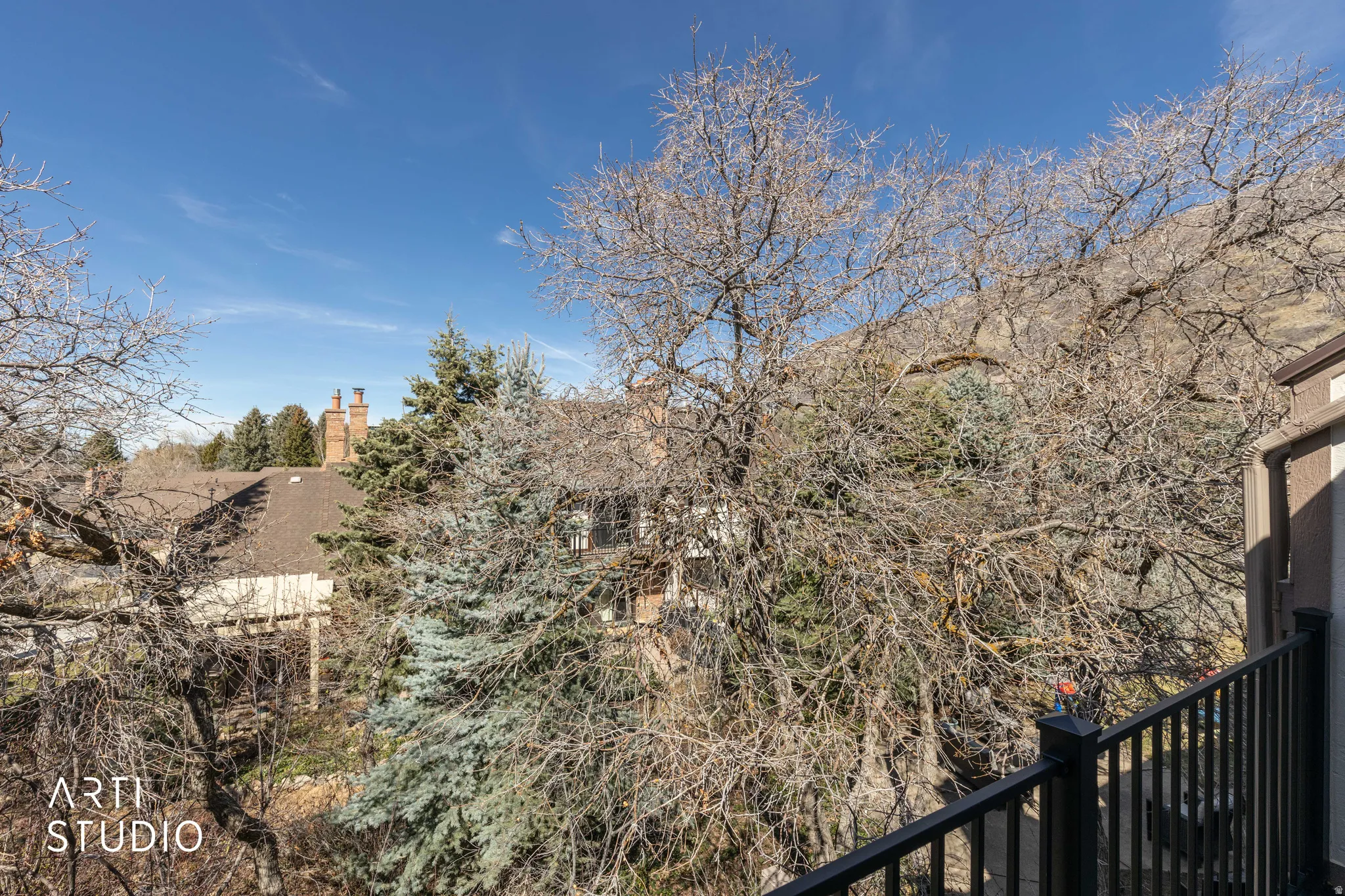 View of yard featuring a balcony