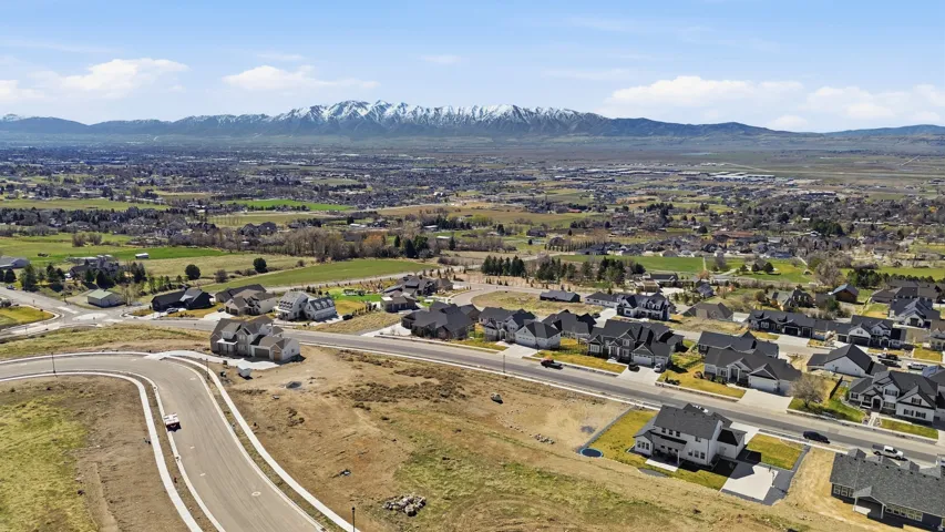 Aerial perspective of suburban area with mountains