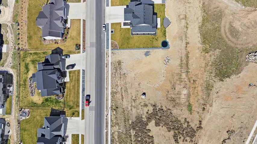 Aerial overview of property's location with nearby suburban area