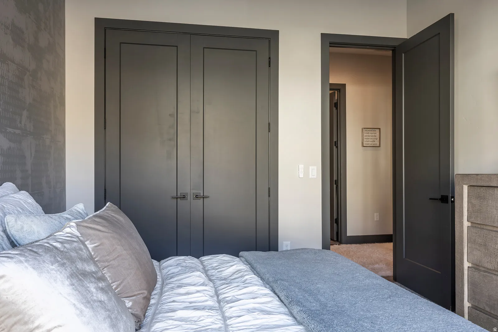 Bedroom with a closet and baseboards