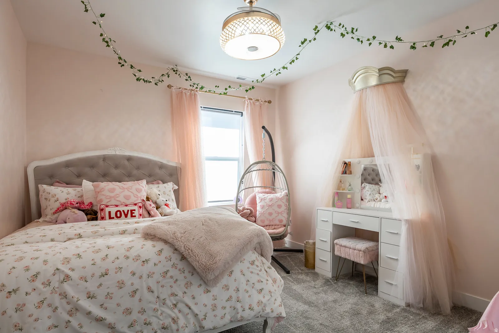 Bedroom with carpet flooring and baseboards