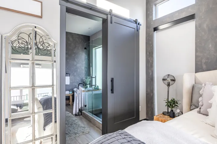 Bedroom featuring a barn door
