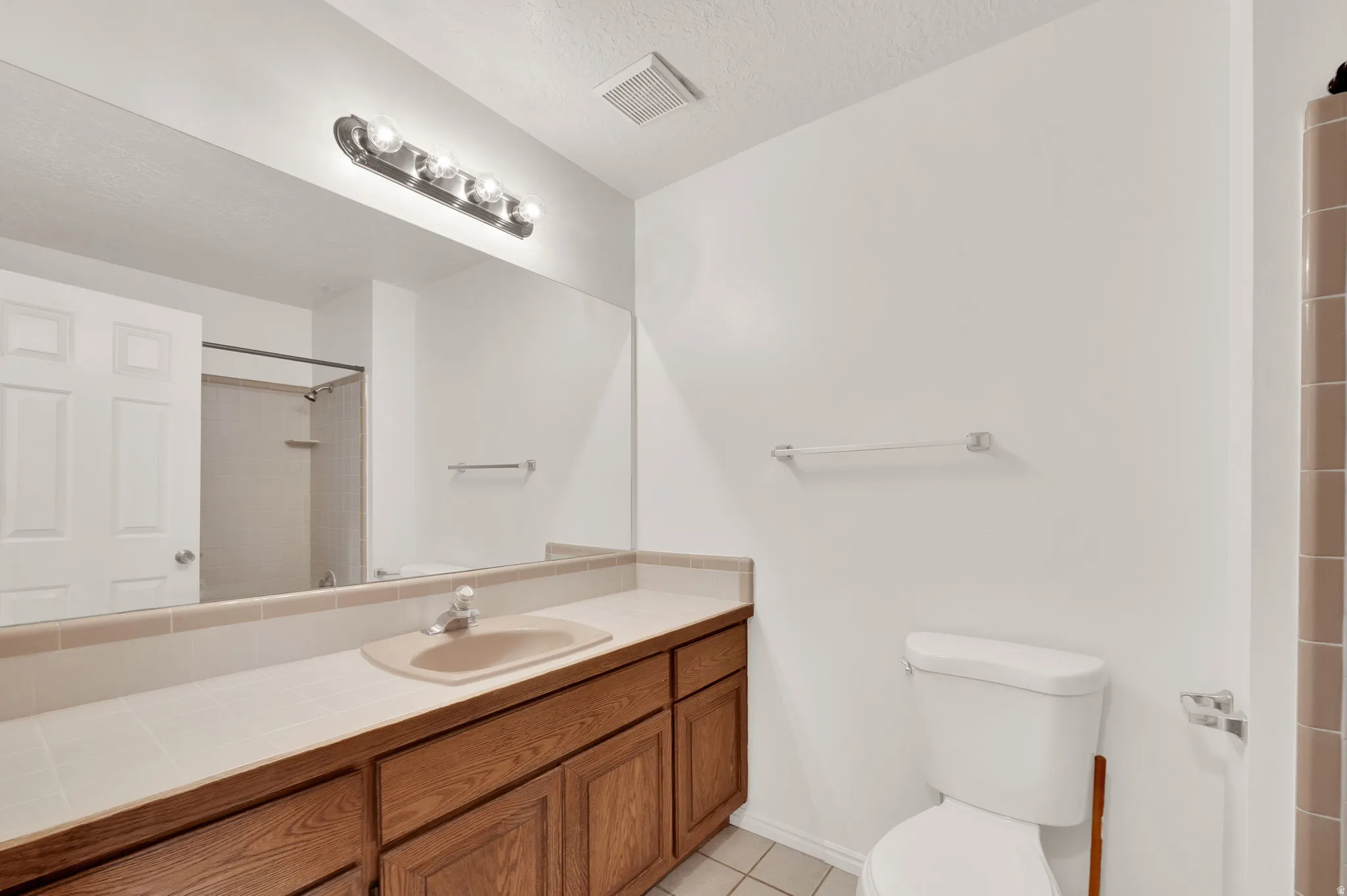 Full bathroom with vanity