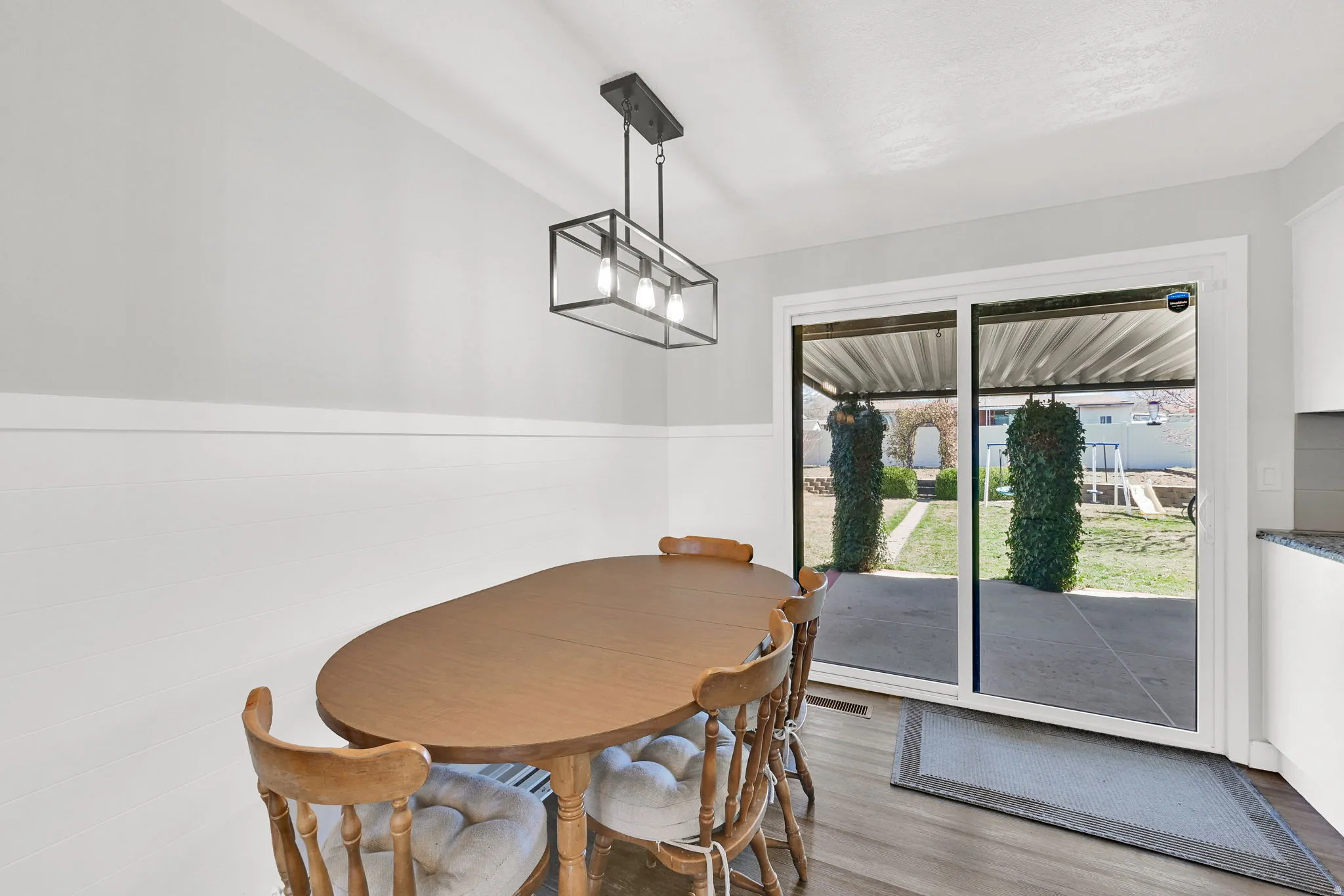 Dining area with light wood-type flooring