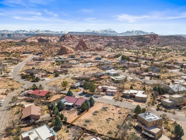 Aerial perspective of suburban area featuring mountains
