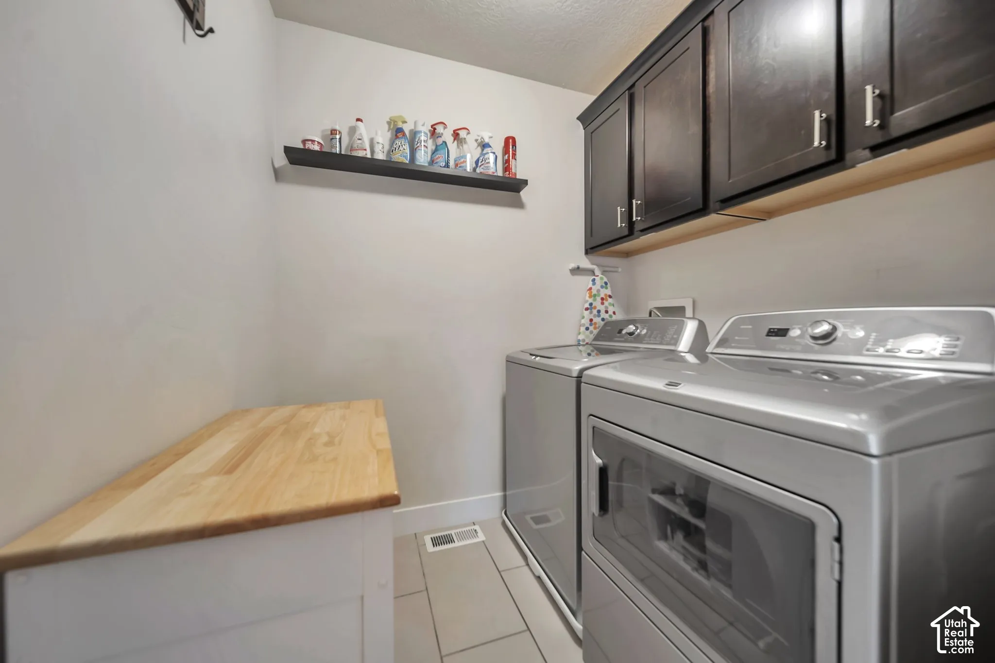 Laundry area with cabinet space