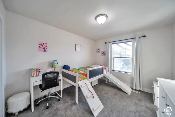 Carpeted bedroom