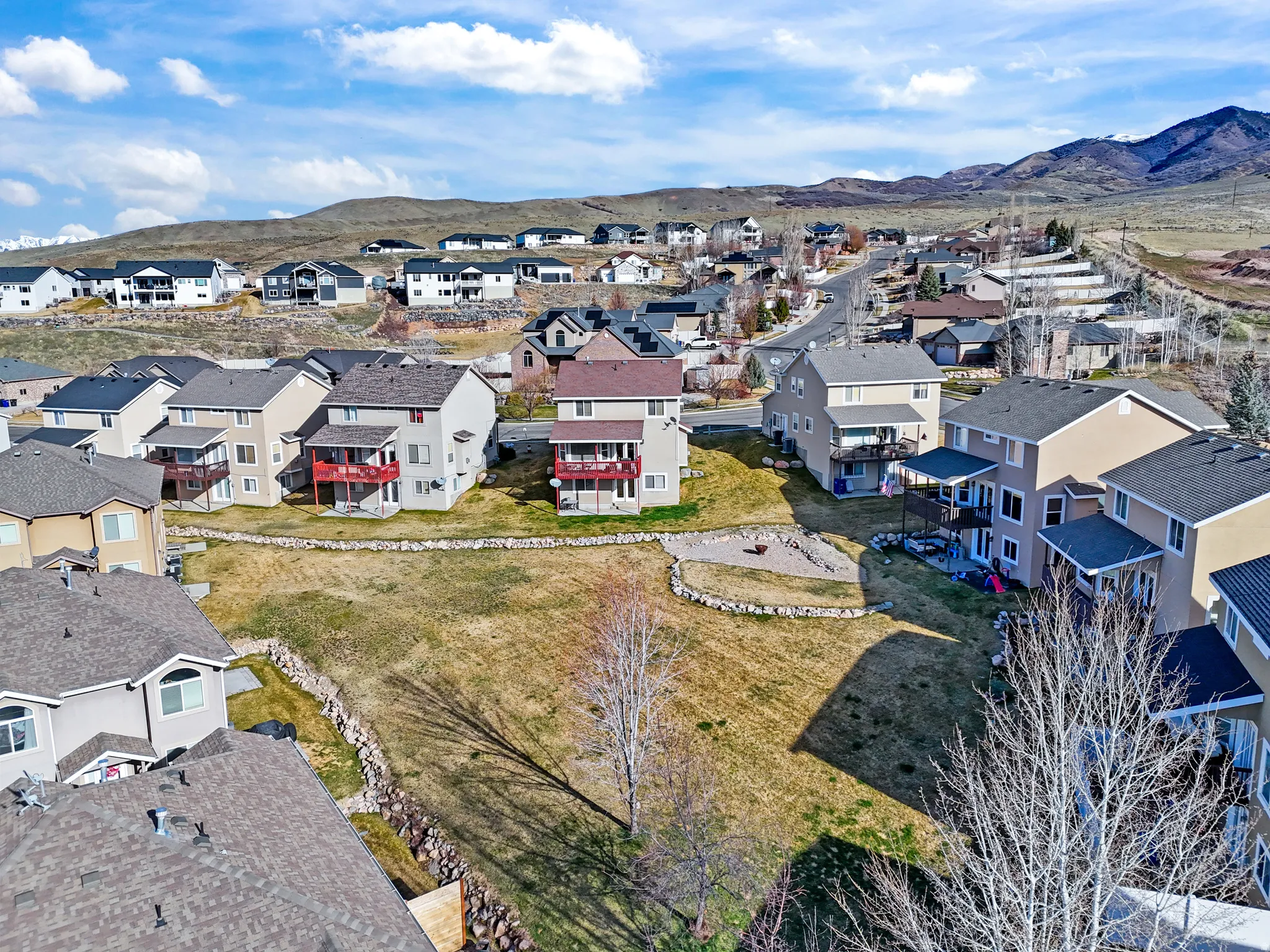 Aerial perspective of suburban area featuring mountains
